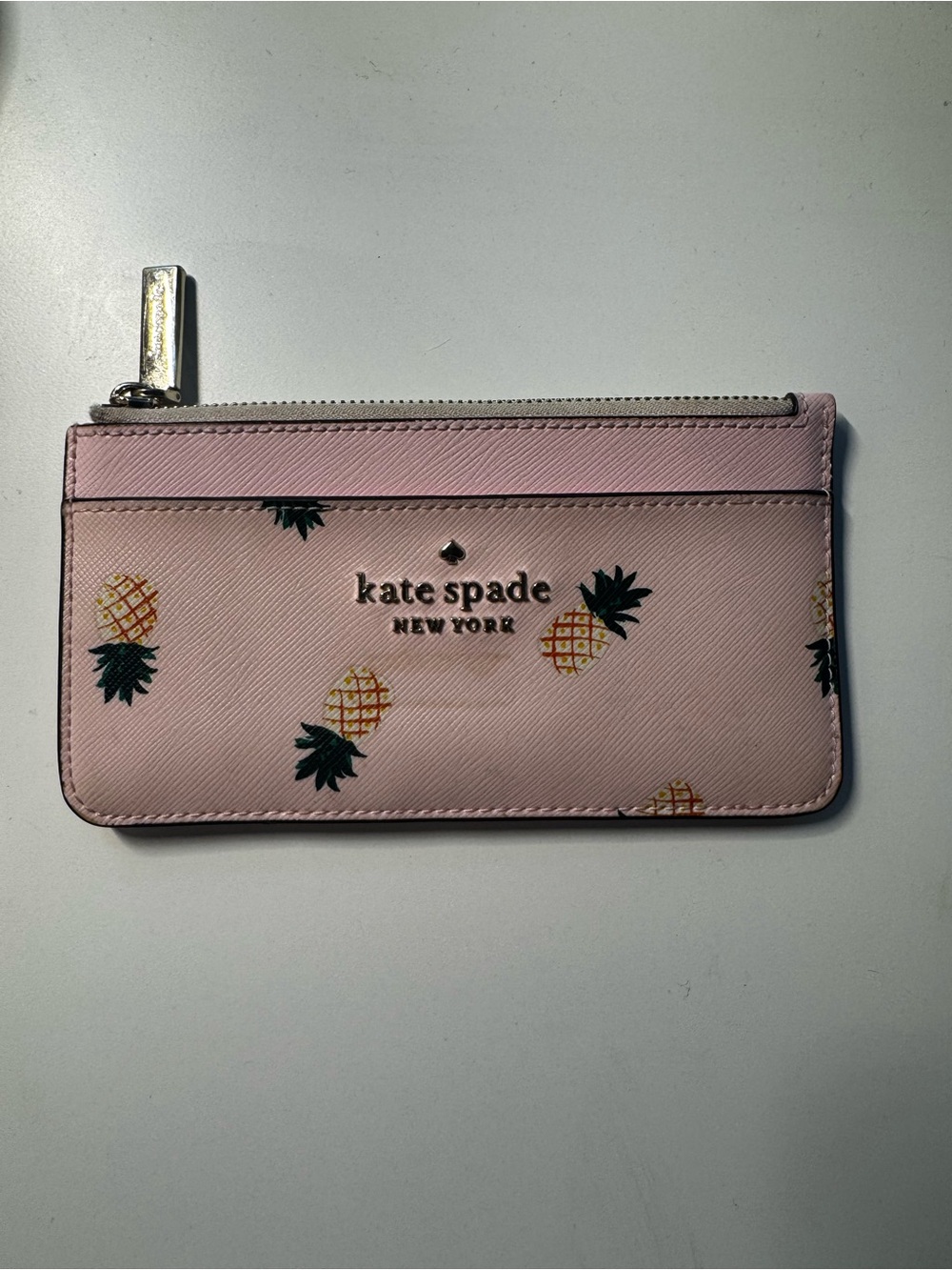 kate spade pink pineapple card zip pouch with gold logo